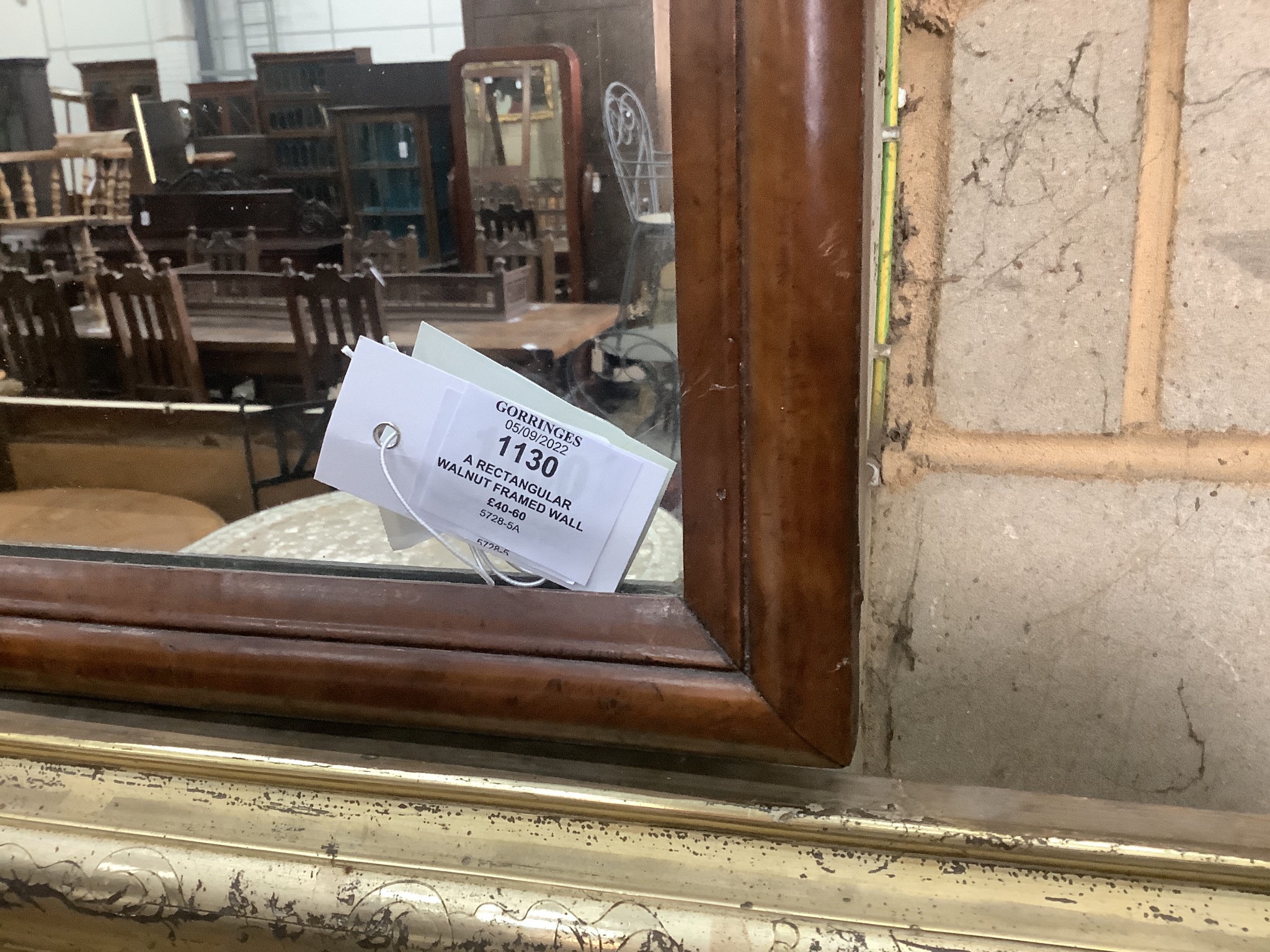 A rectangular walnut framed wall mirror, width 47cm, height 60cm